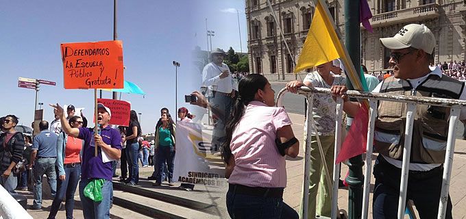 Se enfrentan sindicalizados del Conalep en el desfile