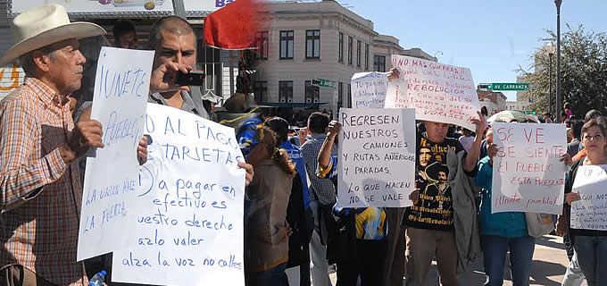 Se manifiestan contra el ViveBus en pleno Desfile 